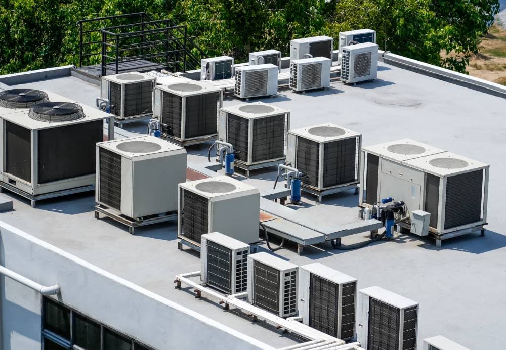 Rooftop commercial HVAC units on a flat roof